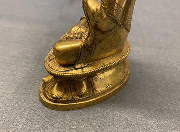 A Chinese gilt bronzen figure of Buddha, Kangxi